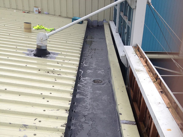 Commercial gutter lining work in progress