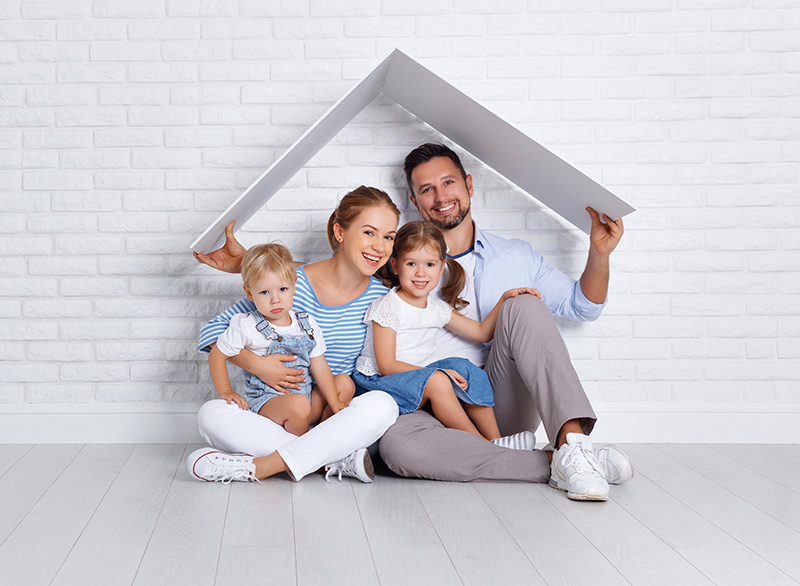 Family shelting under a roof