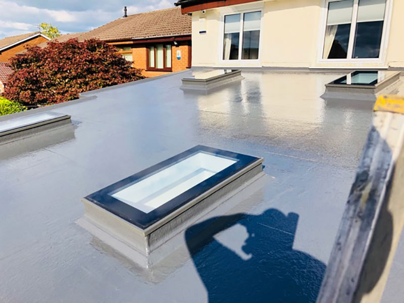 New flat roof with 4 windows