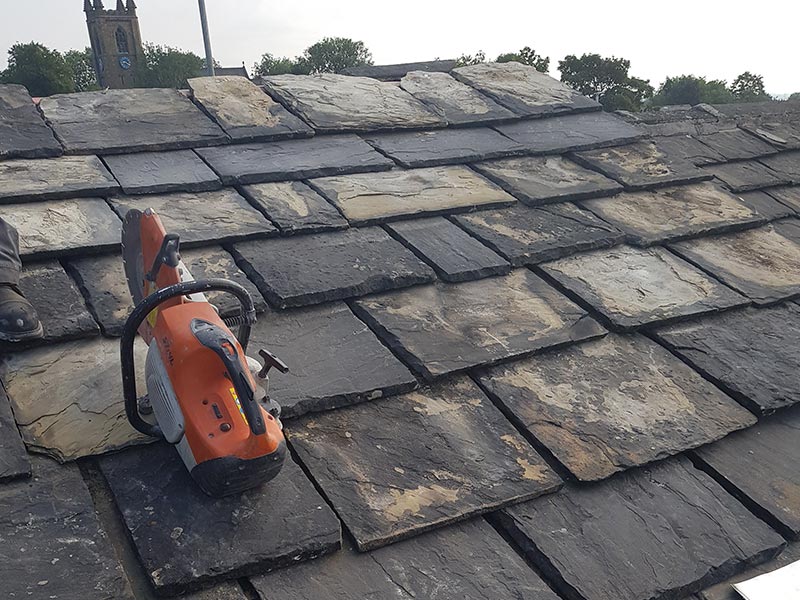 Almost complete roof with stone tiles