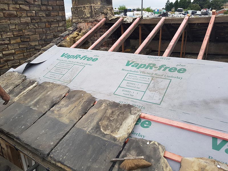 re roof installation using stone tiles